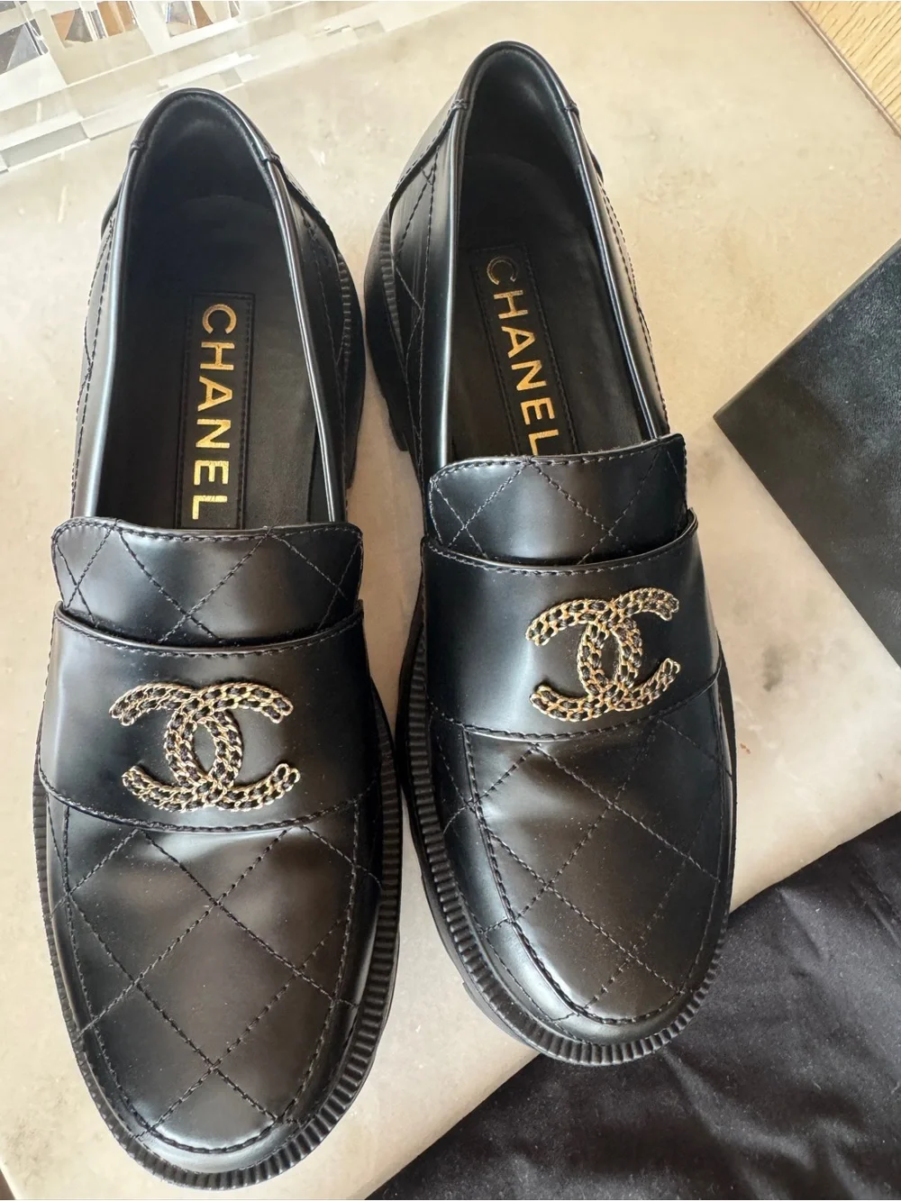 CHANEL Black Quilted Leather Loafers with Gold CC Hardware